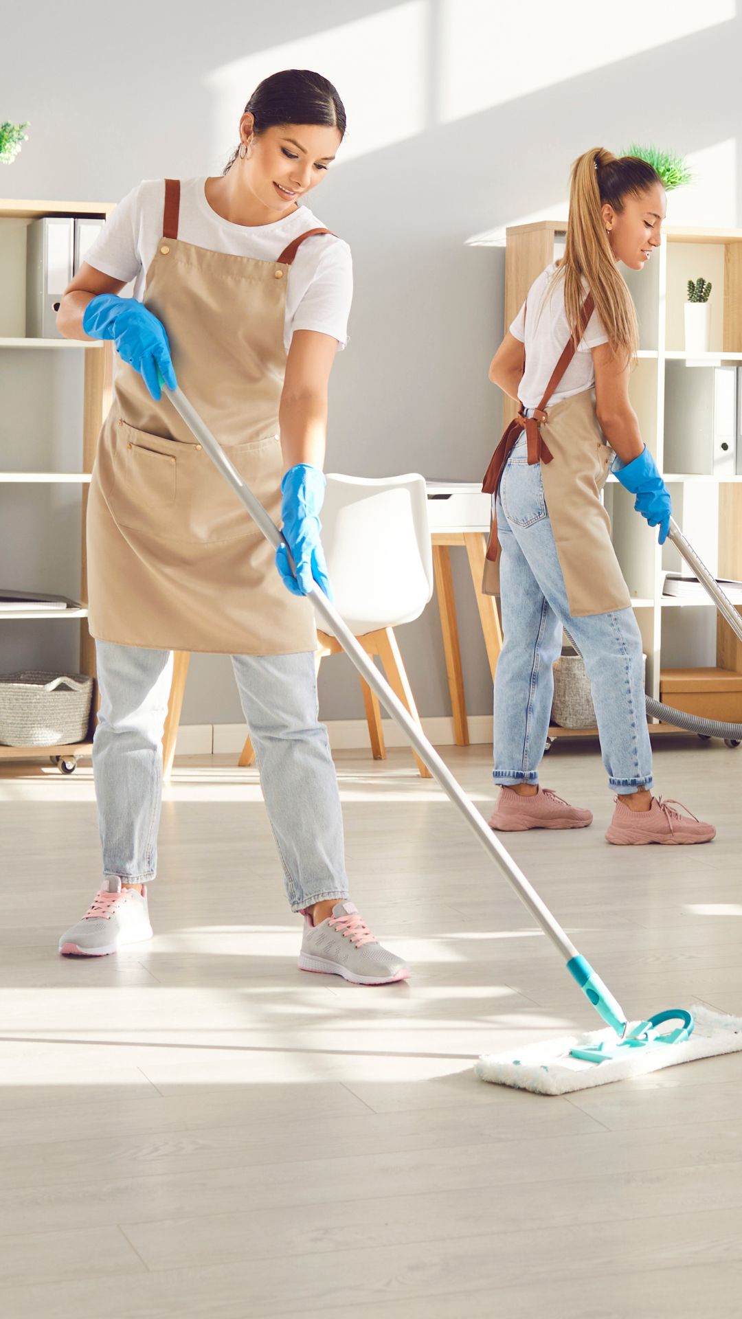 2 girls doing cleaning in post construction in milwaukee